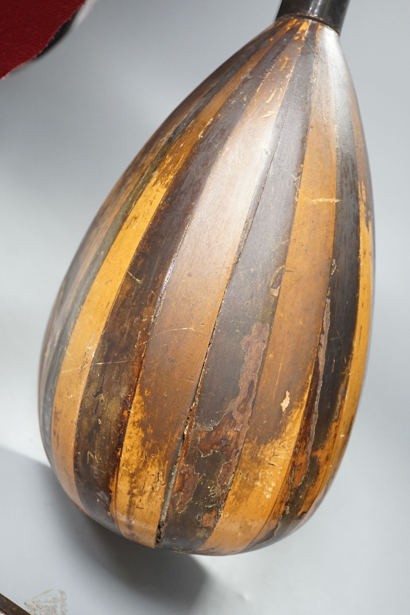 A rosewood and boxwood mandolin with bone pegs, circa 1900